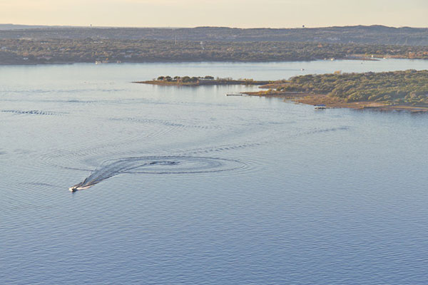 A boat on the waters of Lake Travis in Austin, Texas.